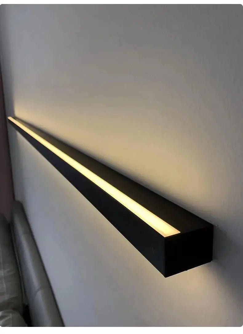 Modern minimalist bedroom, narrow and slender strip wall lamp at the head of the bed, background wall, room lighting decoration